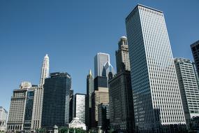 skyscrapers in the city center under the blue sky