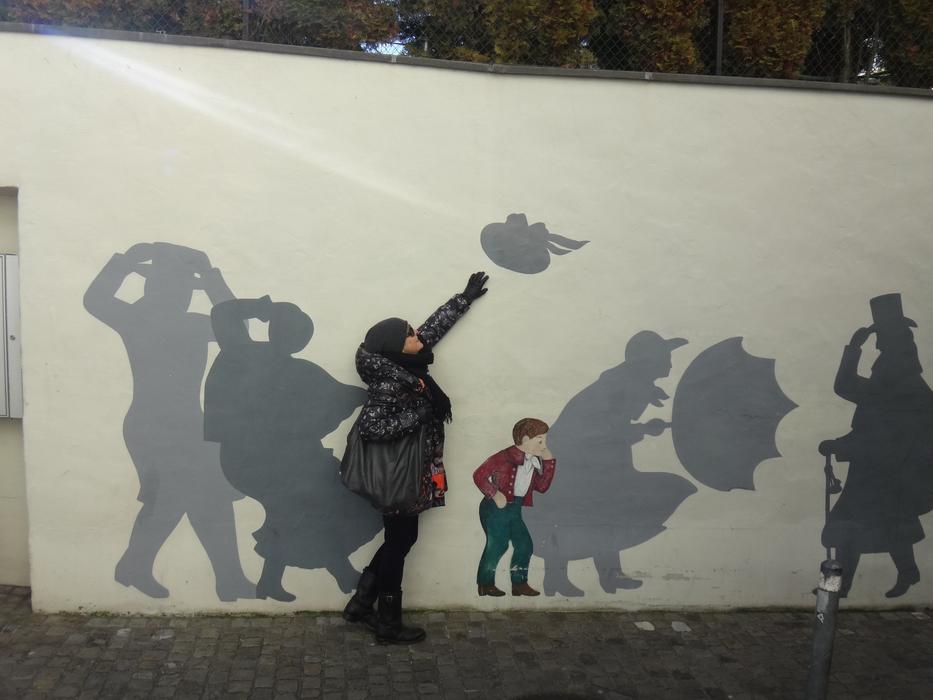 woman on the background of the wall with graffiti Zurich wind