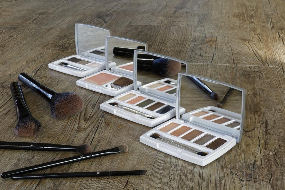 Cosmetics Makeup equipment on wood