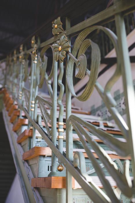 carved white railings