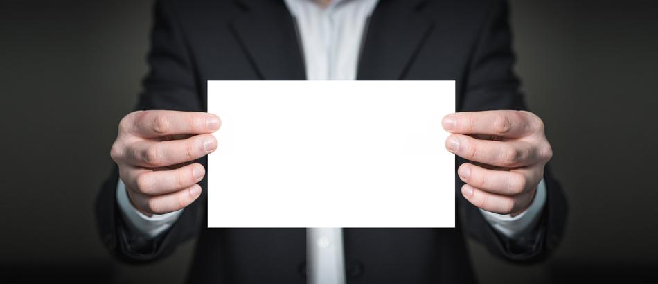 blank piece of paper in hand as a concept