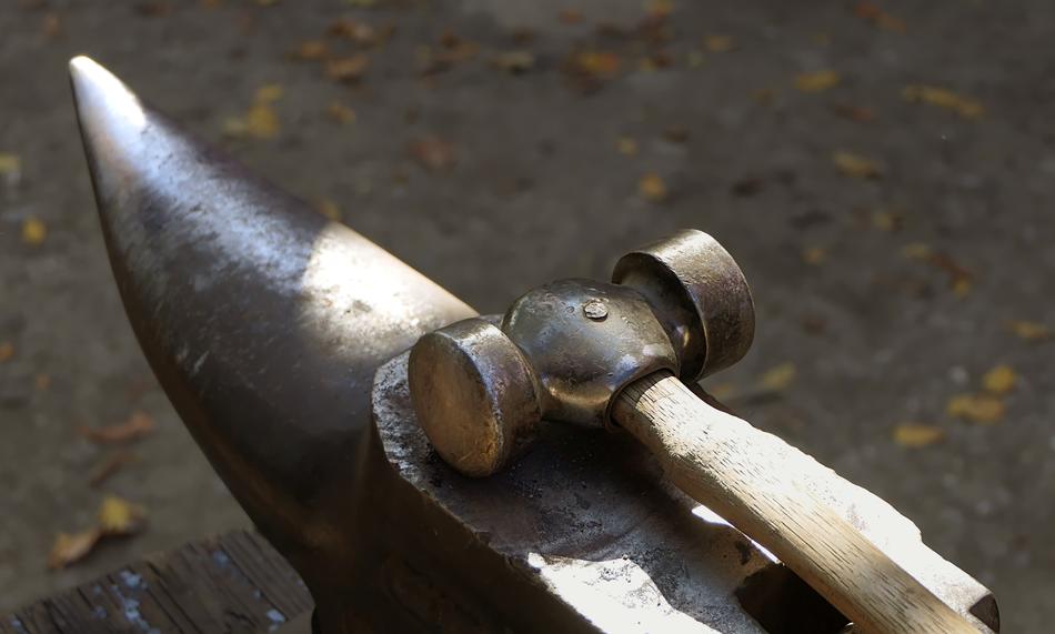 the hammer lies on the anvil