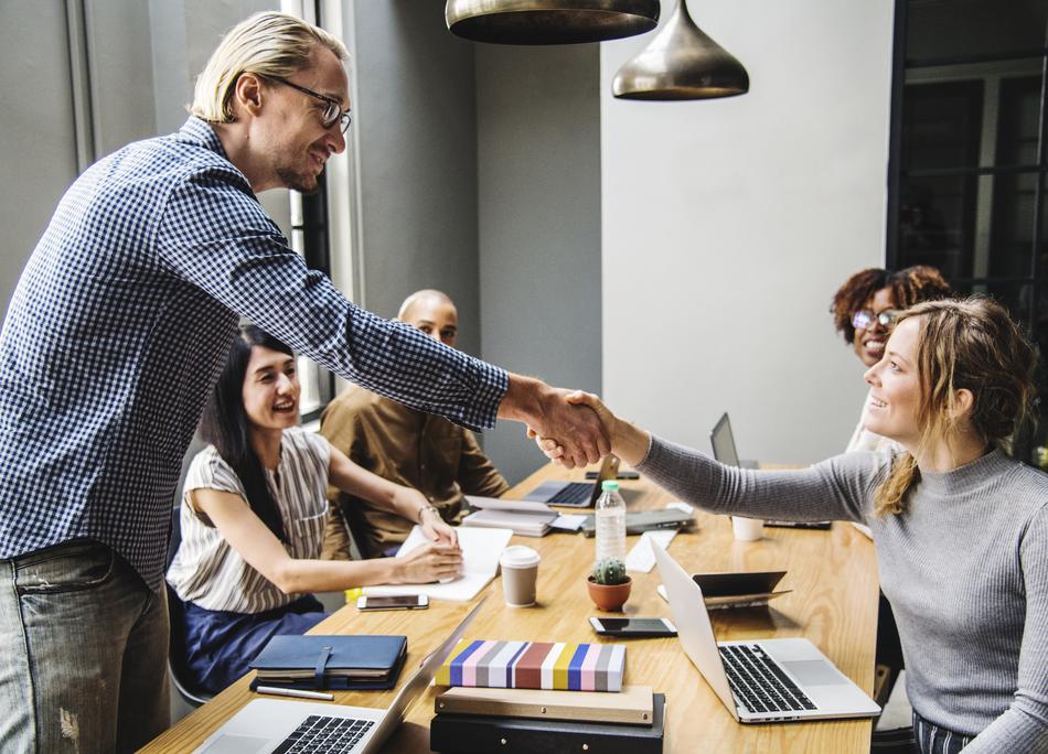 handshake at employee meeting