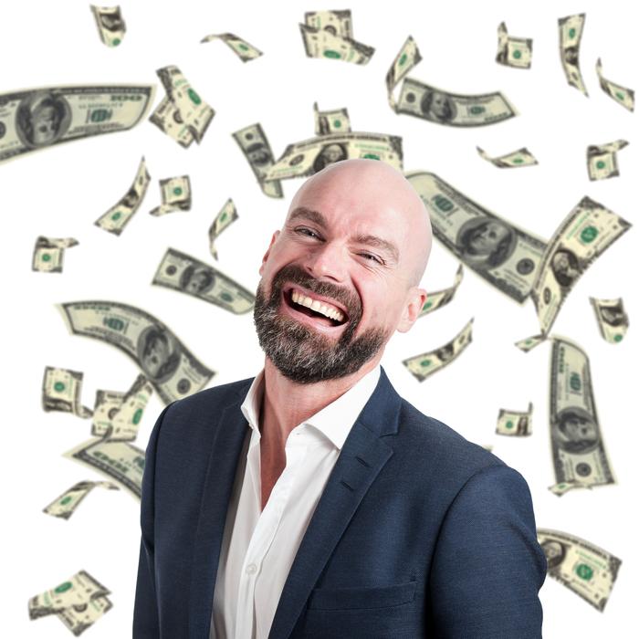 photo of businessman on the background of falling dollars
