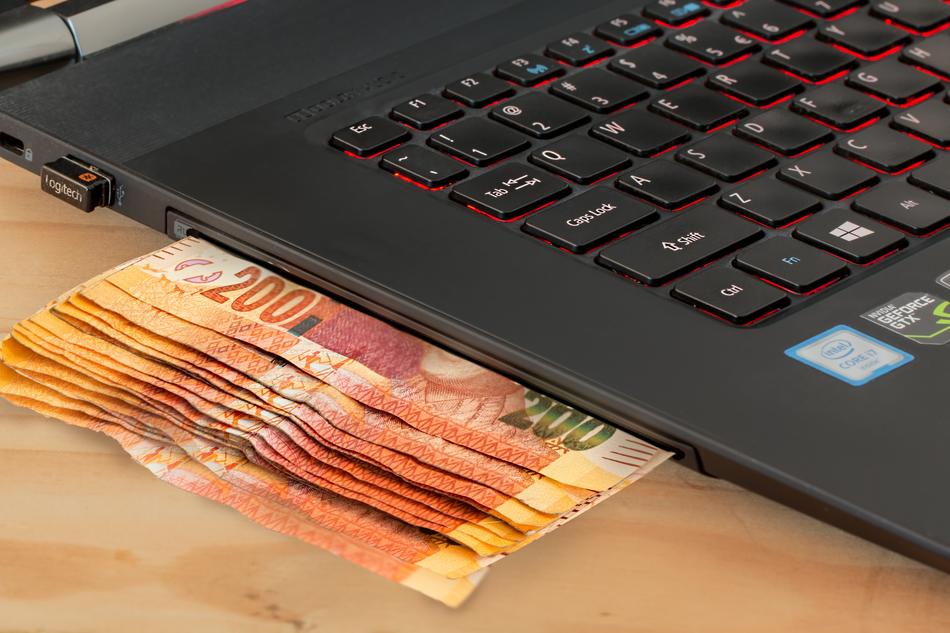 laptop Computer on Cash