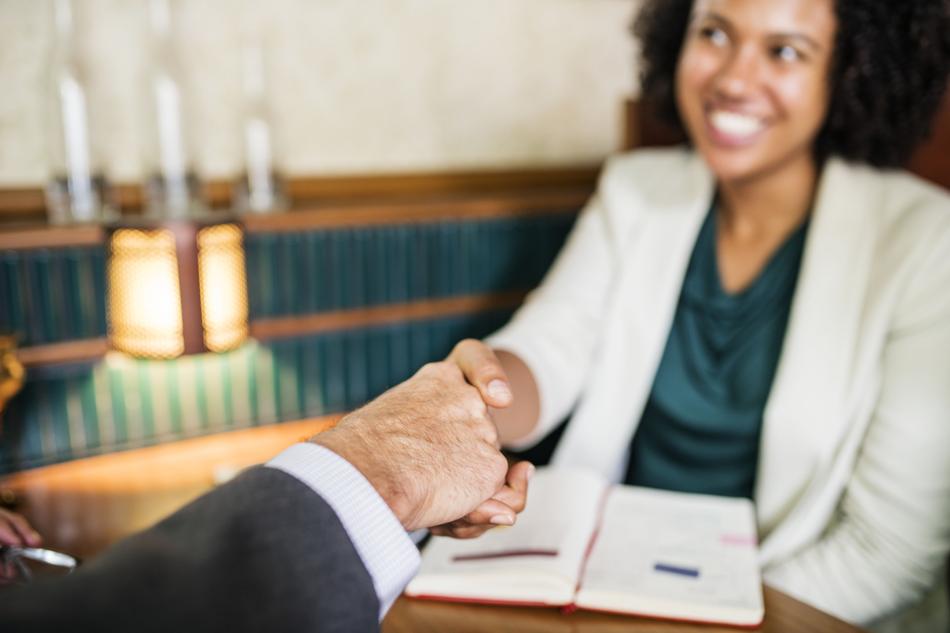 agreement of two in the office in a blurred background