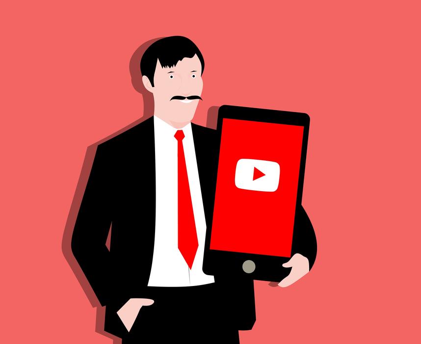 YouTube in the hands of a man as an illustration