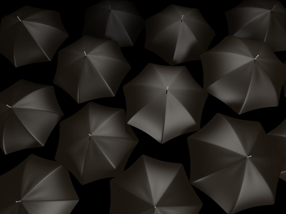 black umbrellas on a black background