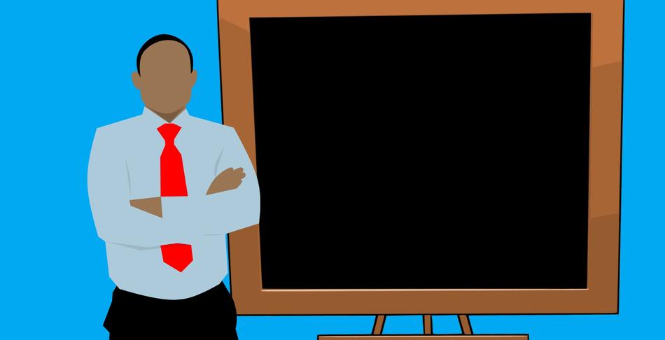 african man near the blackboard as an illustration