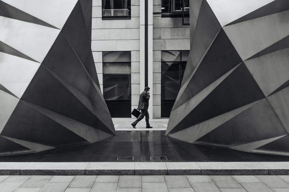 Building and Businessman grey