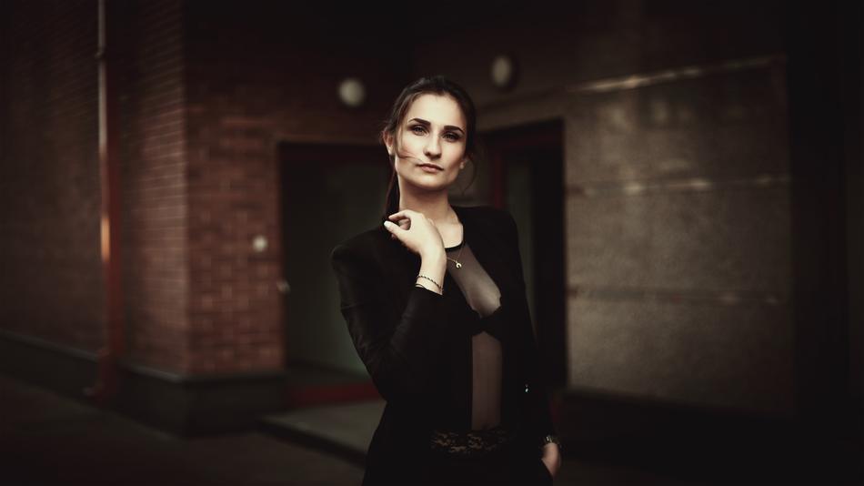 business woman in black transparent blouse