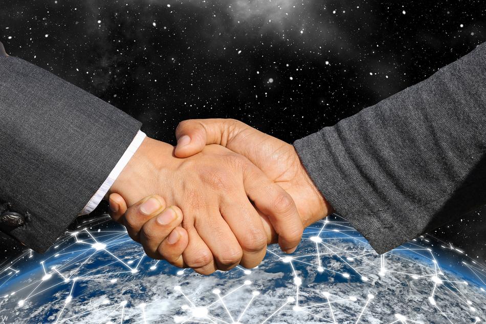 Handshake Shaking with Earth network on background
