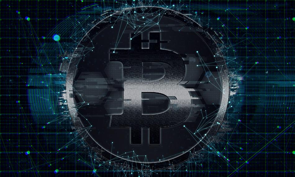 bitcoin symbol at dark background