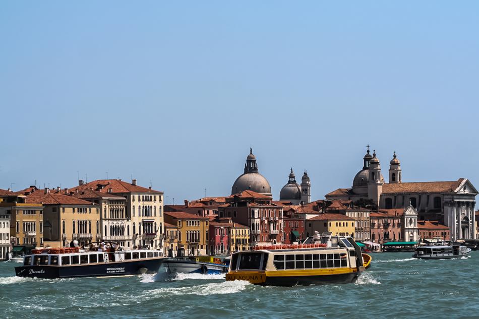 tourist boats on grand canal at landmarks, Italy, Venice