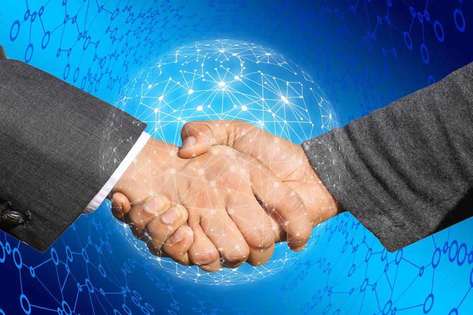 handshake image on the background of the Internet