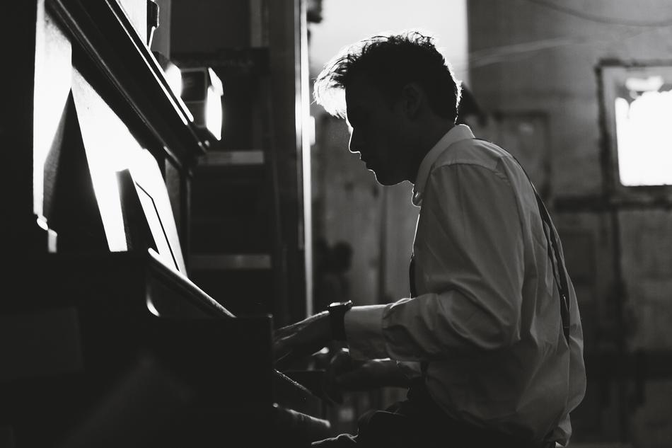 Guy Business piano