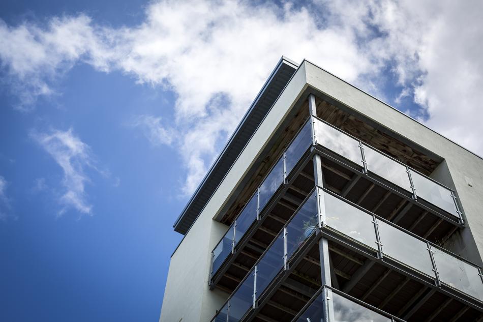 urban building with glass balconies