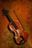 wooden violin on a brown background