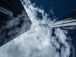 high business towers architecture and cloudy sky