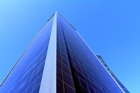 Photo of a blue skyscraper in Madrid, Spain