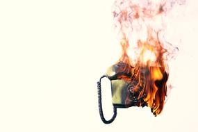 Burning phone on a white background