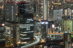 traffic on bridge at Skyscrapers in Night City