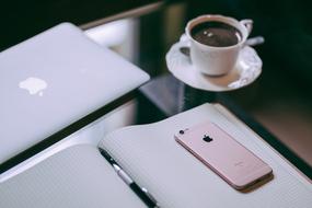 Macbook laptop and pink Iphone