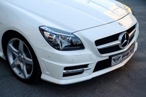 front light of white Mercedes Car