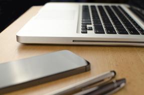 Desk Laptop and grey pens