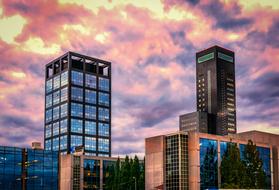 Skyscraper Office Glass and red blue sky