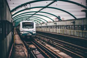 subway Train on open air railroad in city