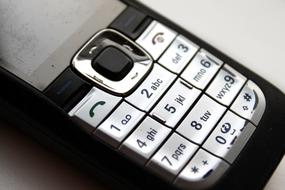 keyboard of vintage cell Phone close up