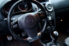 black interior of a bright car Opel