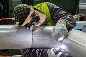 Welder Factory Pipes