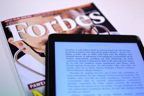 Forbes magazine and tablet
