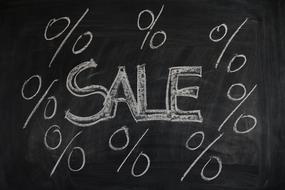 sale percent as a text on board