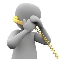 painted white man talking on a wire telephone