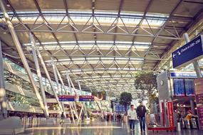 Airport Terminal Flying people