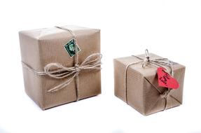 two Boxes with tags wrapped in Paper