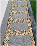 crushed stone and tile path at lawn