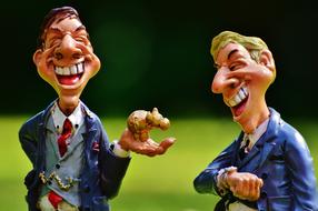 two men laughing, funny figurines