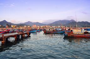 colorful boats on the dock in the harbor