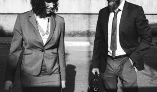 colleagues on a city street in black and white background