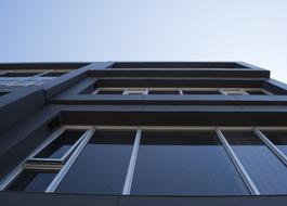 large windows on the facade, bottom view