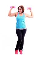 girl with pink dumbbells on a white background