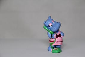 ceramic hippos with phone