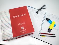 The Labour Code of France, markers and pen on open notebook