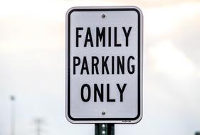family parking road sign