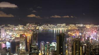 night Cityscape with high-rise Buildings at water, china, Hong Kong