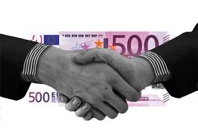 handshake as a symbol of a financial agreement